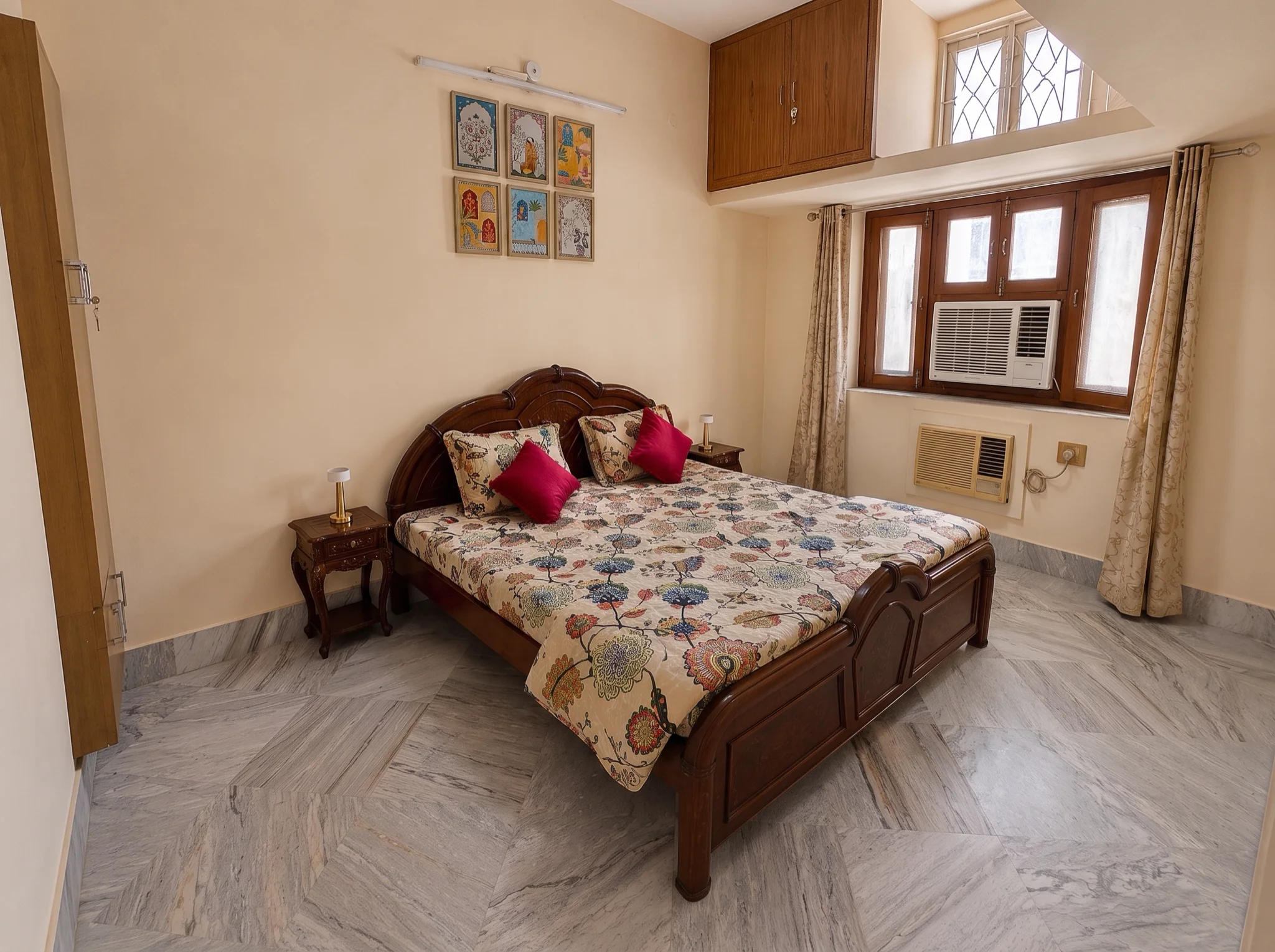 Bedroom with curtains open and window AC